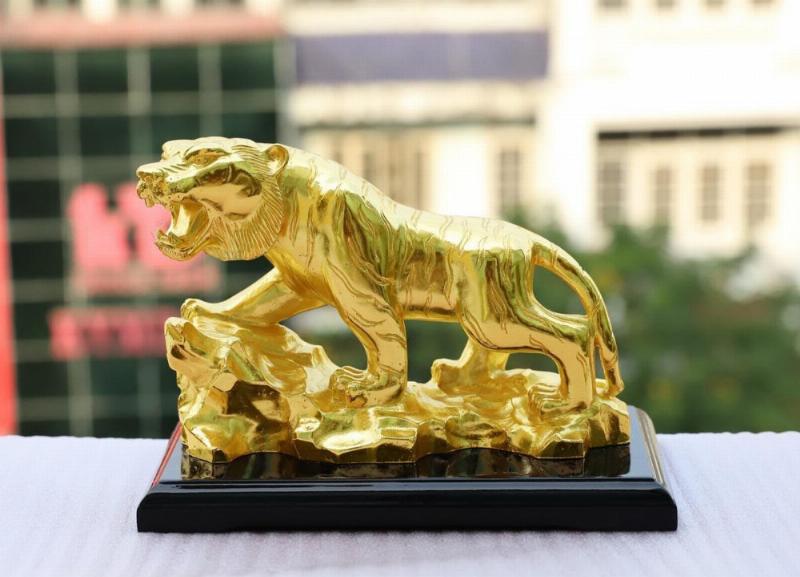 Hình ảnh biểu trưng cho tài lộc và sự nghiệp phát triển của người tuổi Dần trong năm 2022