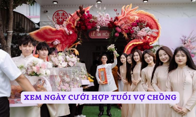 Một cặp đôi trẻ đang xem lịch trên máy tính để chọn ngày cưới, thể hiện sự kết hợp giữa truyền thống và công nghệ hiện đại trong việc xem ngày cưới hỏi.