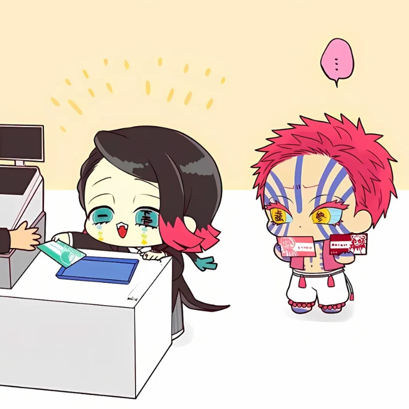 Ảnh anime ác quỷ chibi cute đang cầm một vật thể nhỏ, đầy tò mò