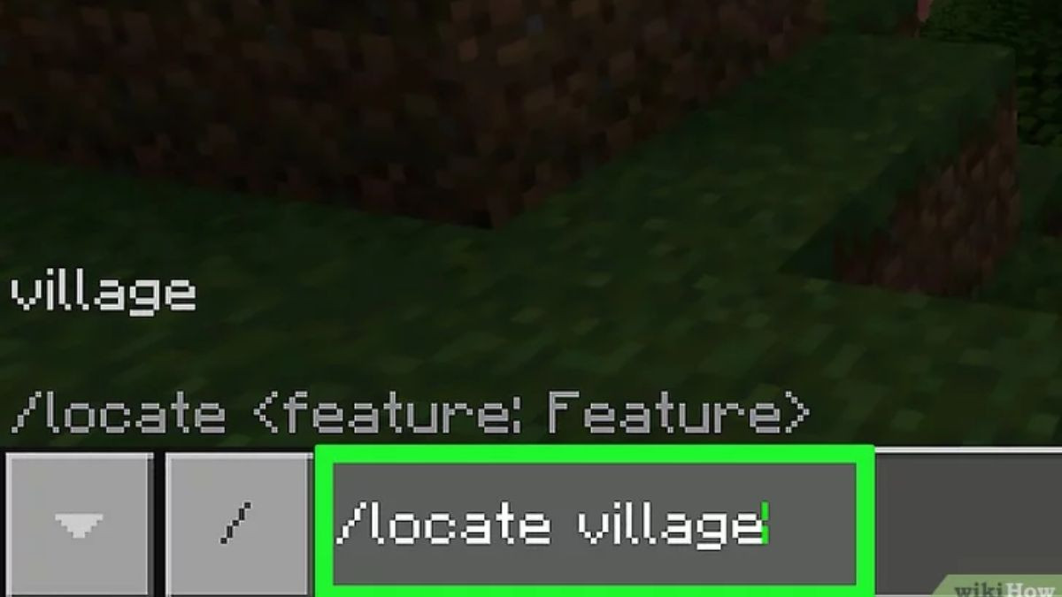 Khung chat trong Minecraft trên điện thoại hiển thị lệnh '/locate village' đã được nhập, cho thấy kết quả tọa độ làng.